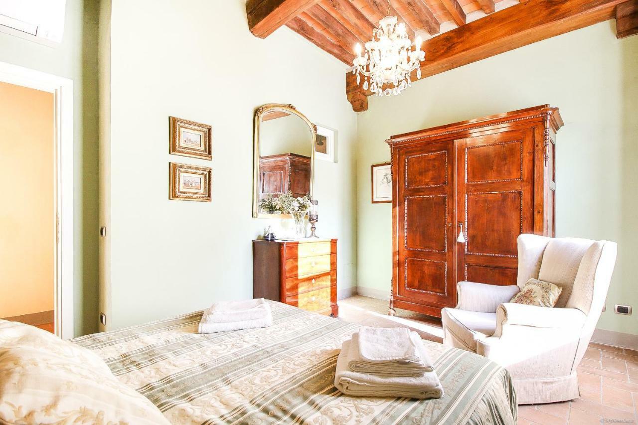 Apartment Guinigi With Private Courtyard Lucca Bagian luar foto